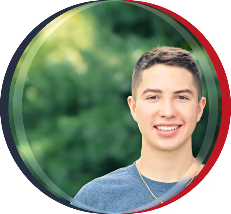 Three smiling boys standing in a row