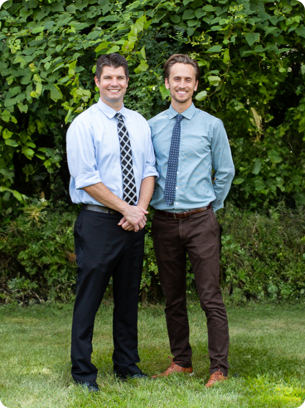 Dr. Wigal and Dr. Kluemper standing outside smiling