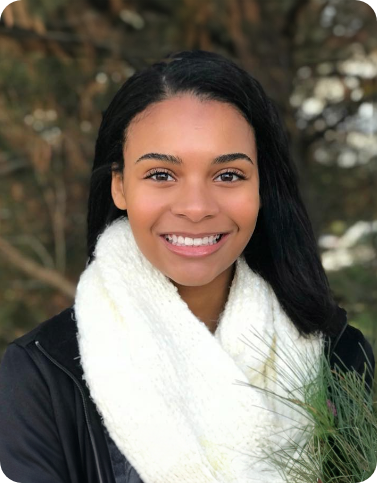 Young woman with scarf smiling