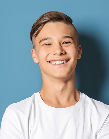 Smiling boy with red shirt